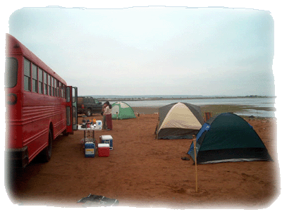 Gus and friends camping by beach