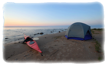 tent and kayak at the beach